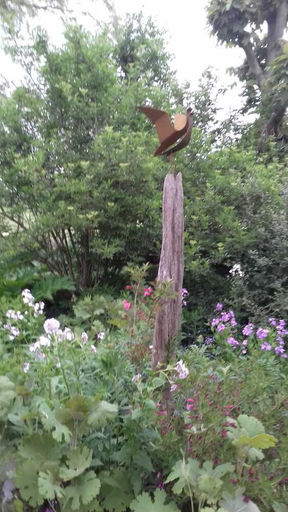 grutto (staand mer gespreide vleugels)